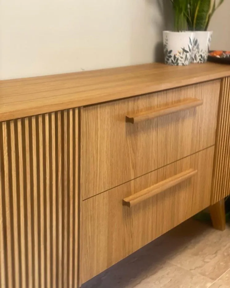 Fluted oak sideboard door with a carved oak handle